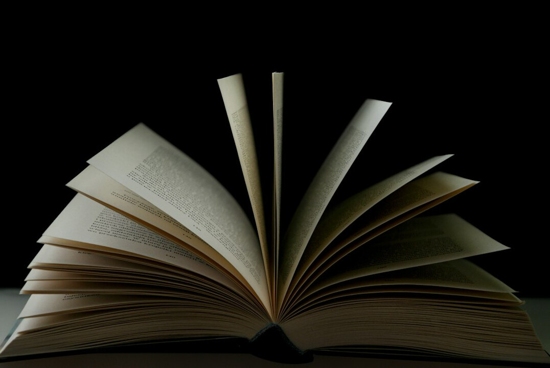 book pages with mysterious text