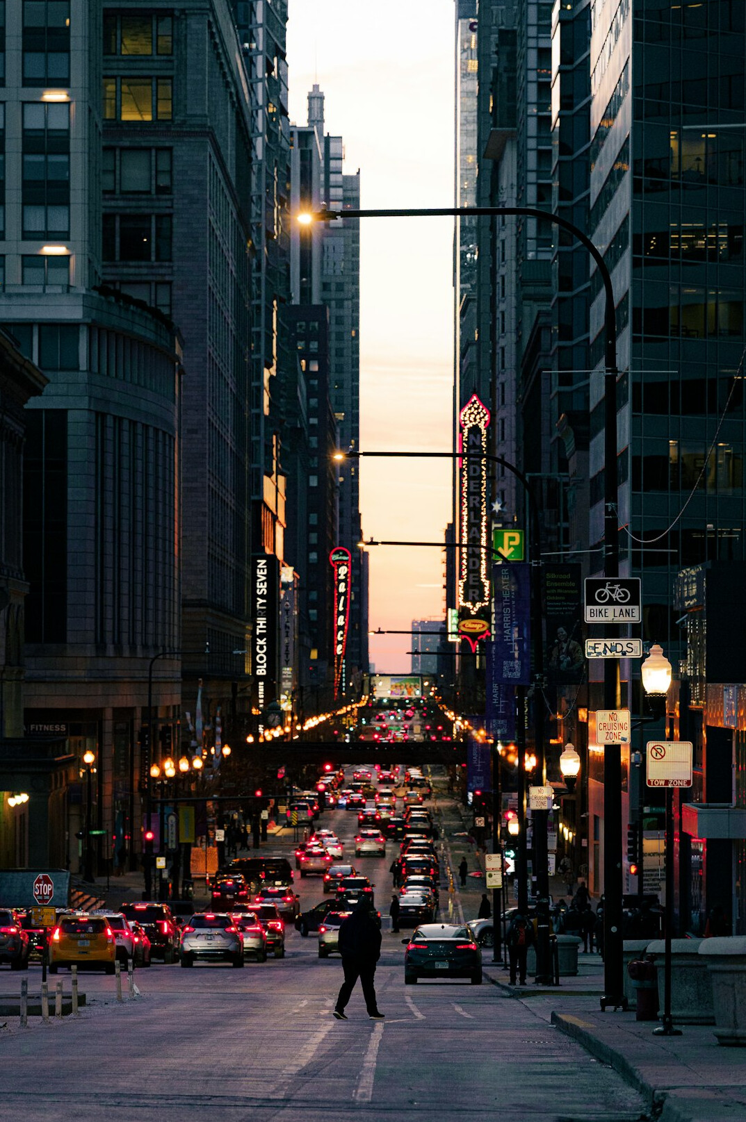 crowded city street at dusk